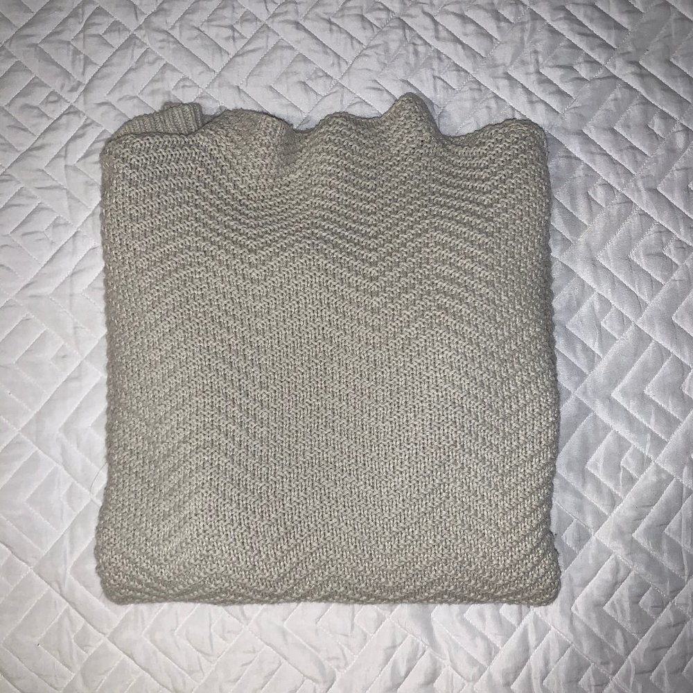 beige/khaki colored knit sweater